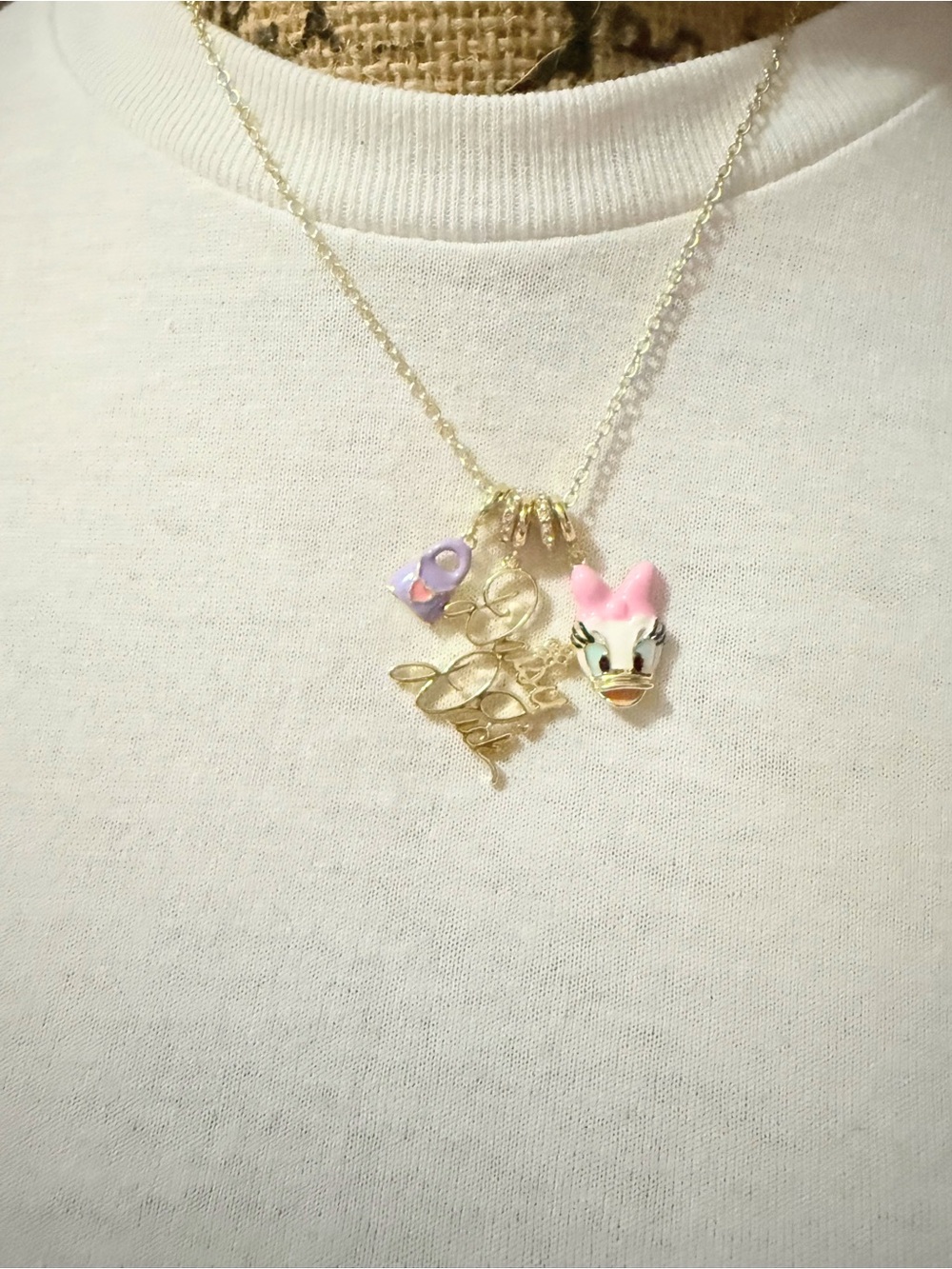 Gold Tone Daisy & Pink Bow Charm Necklace with Purple Accent